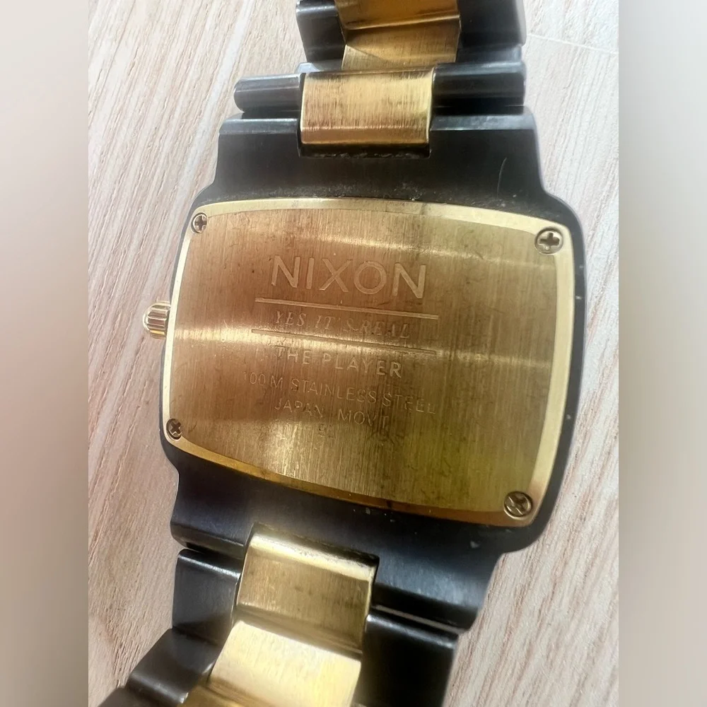 Nixon the player gunmetal gray and gold tone watch NEW BATTERY